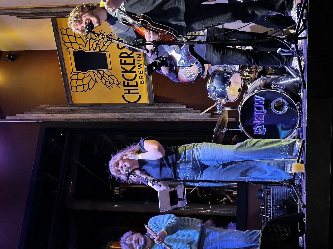A live band performing on the Checkerspot stage