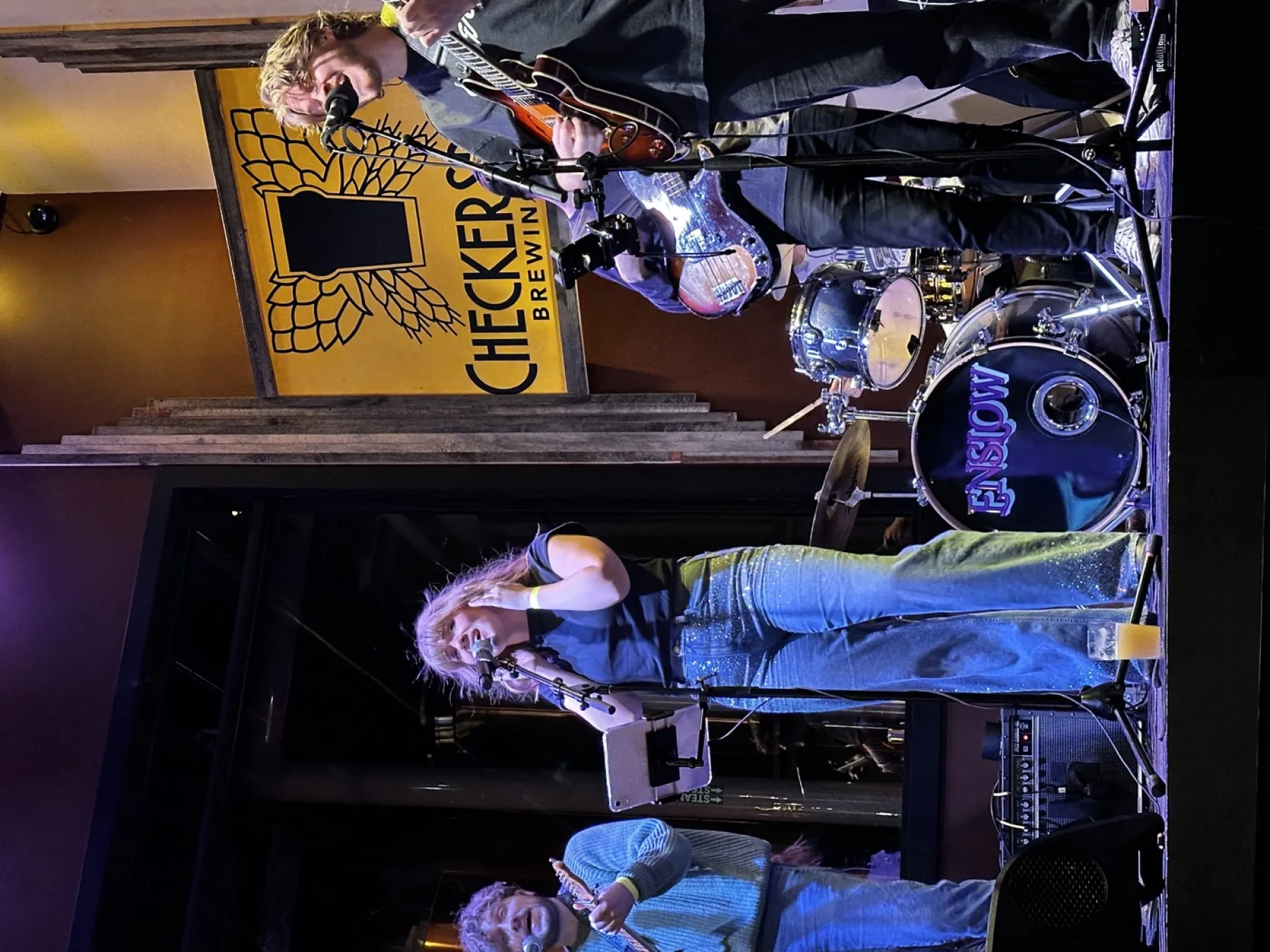 A live band performing on the Checkerspot stage